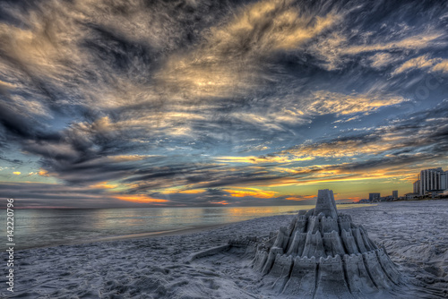 Fototapeta Naklejka Na Ścianę i Meble -  Sandcastle at sunset on the beach in Destin Florida