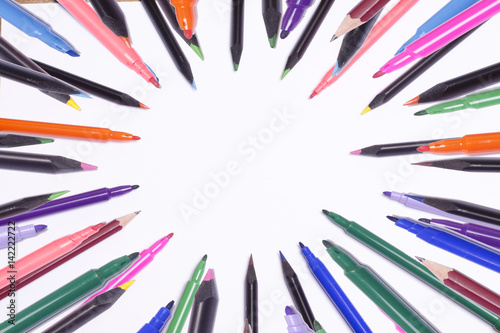 Diagonal fragment of opened colorful markers;