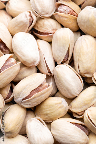 Pistachios nuts background, top view, healthy snack