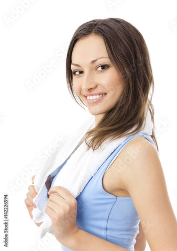 Woman in fitness wear with towel, isolated