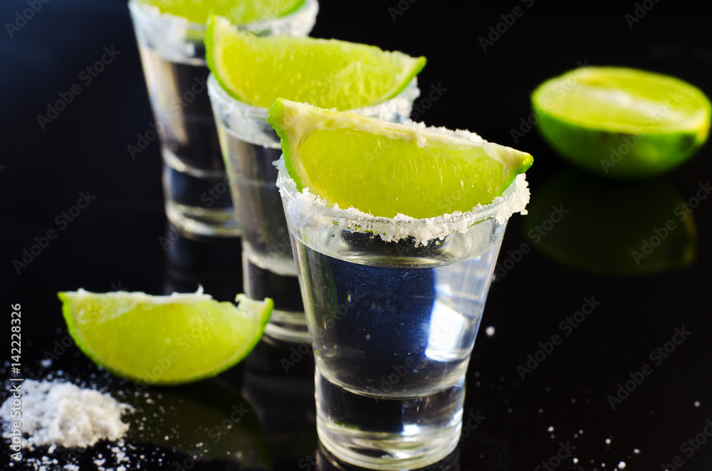 Silver tequila with lime and salt Silver tequila with lime and salt