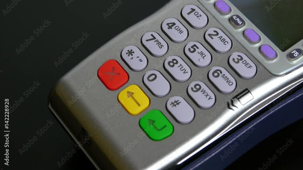 Typing numbers on a credit card terminal Typing numbers on a credit card terminal