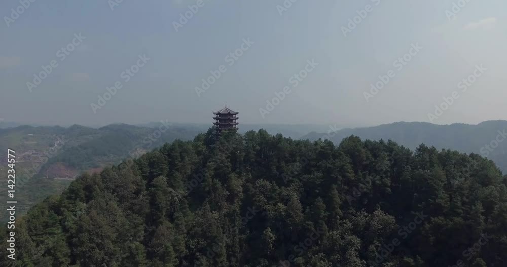 Beautiful aerial shot of oriental temple on top of Fenghuang Ancient City in Hunan province China. Top view of famous chinese landmark. Beautiful aerial shot of oriental temple on top of Fenghuang Ancient City in Hunan province China. Top view of famous chinese landmark.