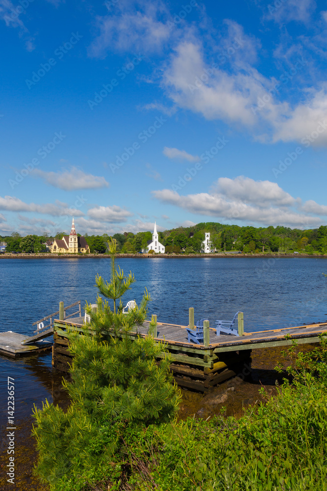 Three churches across the water in Mahone Bay, Nova Scotia, Canada. Three churches across the water in Mahone Bay, Nova Scotia, Canada.