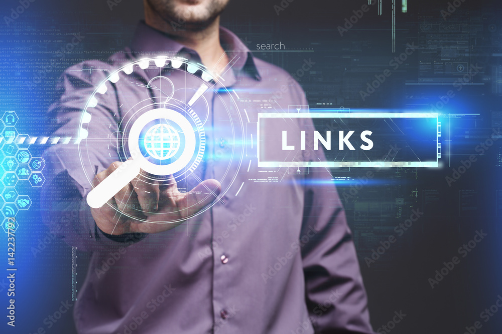 Business, Technology, Internet and network concept. Young businessman working on a virtual screen of the future and sees the inscription: Links Business, Technology, Internet and network concept. Young businessman working on a virtual screen of the future and sees the inscription: Links