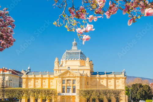 Wallpaper Mural     Spring in Zagreb, Croatia, tree blossom and art pavilion on king Tomislav square  Torontodigital.ca