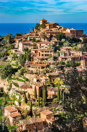 Beautiful view of the idyllic mediterranean mountain village Deia on Majorca island photo