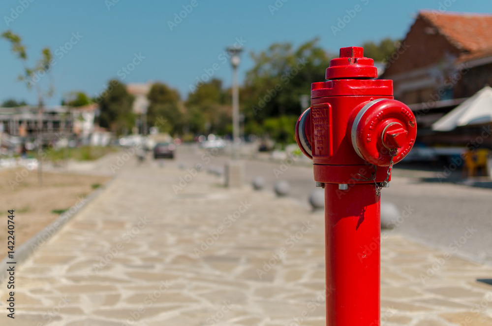 red fire hydrant on blurred background red fire hydrant on blurred background