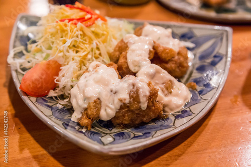 Chicken nanban - deep fired chicken with tartar sauce photo