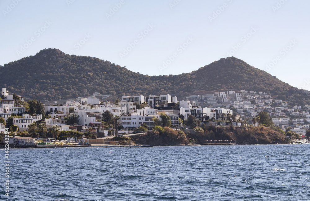 Village full of summer houses in Yalikavak area in Bodrum peninsula. Architectural style of the region is all white homes.