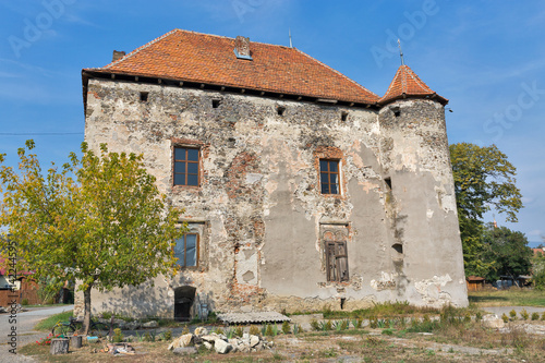 Abandoned medieval castle Saint Miklosh, Chinadievo, Western Ukraine. photo