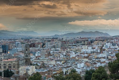 Rolling clouds over Malaga cityscape © marcin jucha