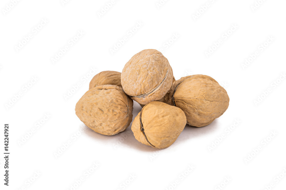 group of walnuts isolated on white background. group of walnuts isolated on white background.