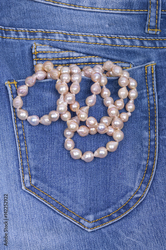 Jeans and Pearl Necklace