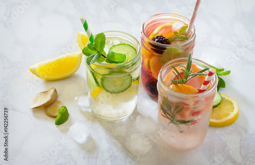 Fruit refreshing water. Summer cold drinks with blackberries, grapefruit, lemon and mint. The concept of healthy and dietary nutrition.