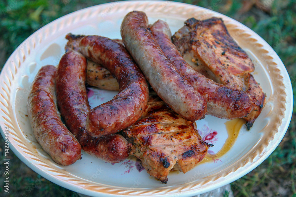 Kupaty, fried in the grill. 2012 year, Ukraine. Delicious! A lot of calories, it is not advisable to eat those who are on a diet Kupaty, fried in the grill. 2012 year, Ukraine. Delicious! A lot of calories, it is not advisable to eat those who are on a diet