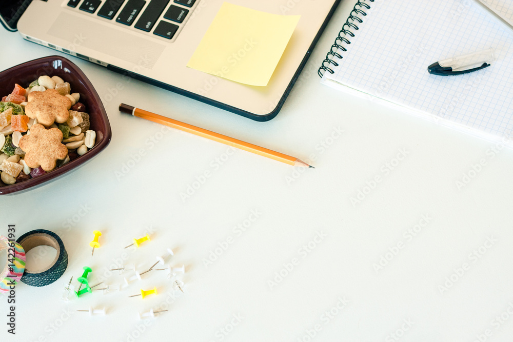 Workspace with laptop notebook sticky notes on white background ...