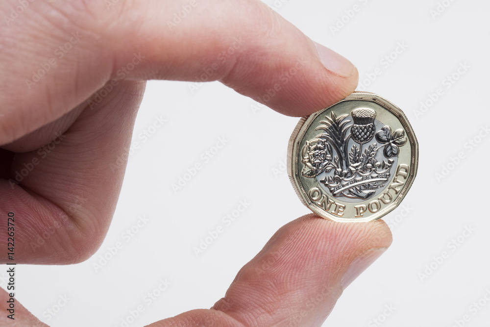 New British sterling one pound coin New British sterling one pound coin