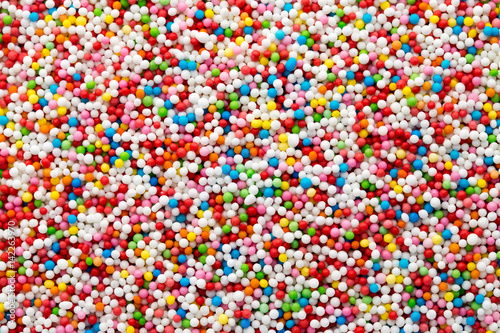 Multicoloured sweet sugar balls. Small ball pattern.