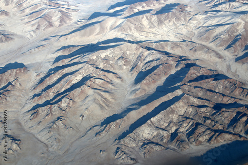 Mongolia aerial view of mountains covered with snow in the winter