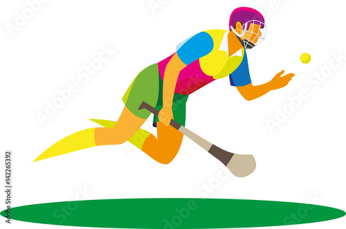 Irish player in field hockey in the fall catches the ball