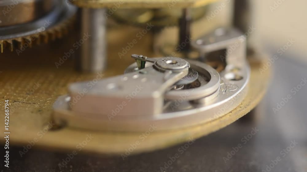 Close up of a internal clock mechanism. ?ndustrial video background or Time concept. Fast moving Timelapse Close up of a internal clock mechanism. ?ndustrial video background or Time concept. Fast moving Timelapse