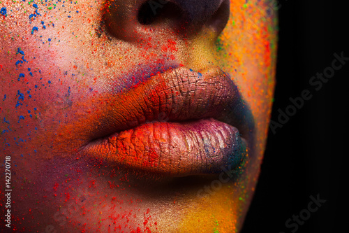 Lips of model with colorful...