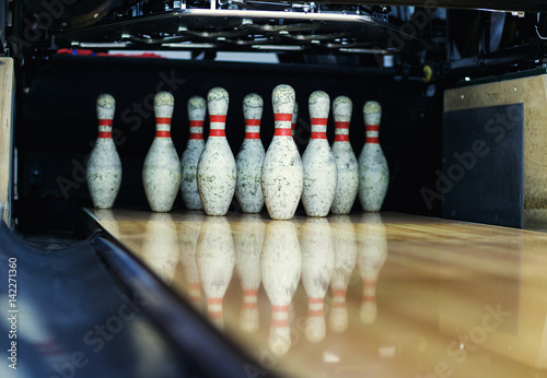 Принти на полотні Pins at the end of a bowling alley,Skittles for bowling,bowling game
