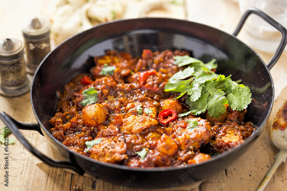 Chicken piri piri hot and sour curry made with marinated chicken breast, onions, tomatoes and red chillies Chicken piri piri hot and sour curry made with marinated chicken breast, onions, tomatoes and red chillies