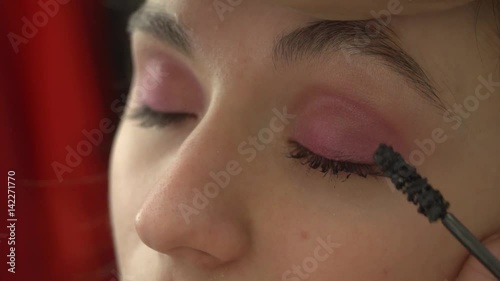 Pink Eye make-up Stock Footage. Model: Mary