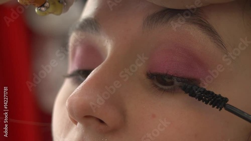 Pink Eye make-up Stock Footage. Model: Mary