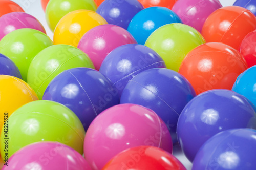 Plastic colored children's balls © Bokeh Art Photo