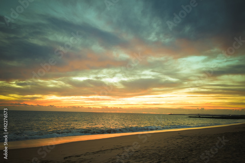 Magic hour of natural colorful dawn over the sea sunny background outdoor © gorosi