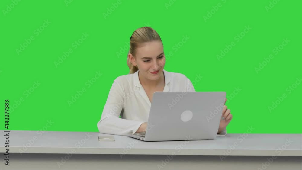 Woman enjoy a good day at job place, dancing and singing on a Green Screen, Chroma Key. Woman enjoy a good day at job place, dancing and singing on a Green Screen, Chroma Key.