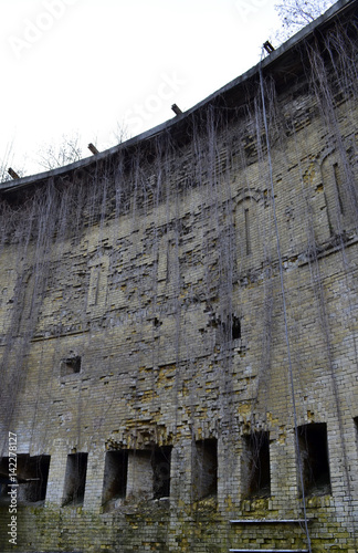 A ruined castle: wall with embrasures