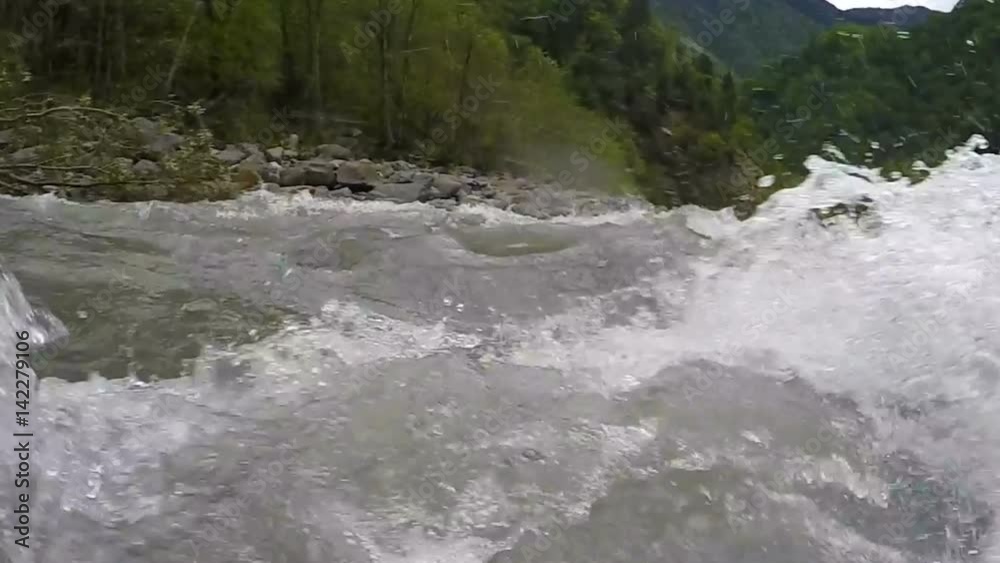 Rafting with large waves, rocks and hazards requiring precise maneuvering Rafting with large waves, rocks and hazards requiring precise maneuvering