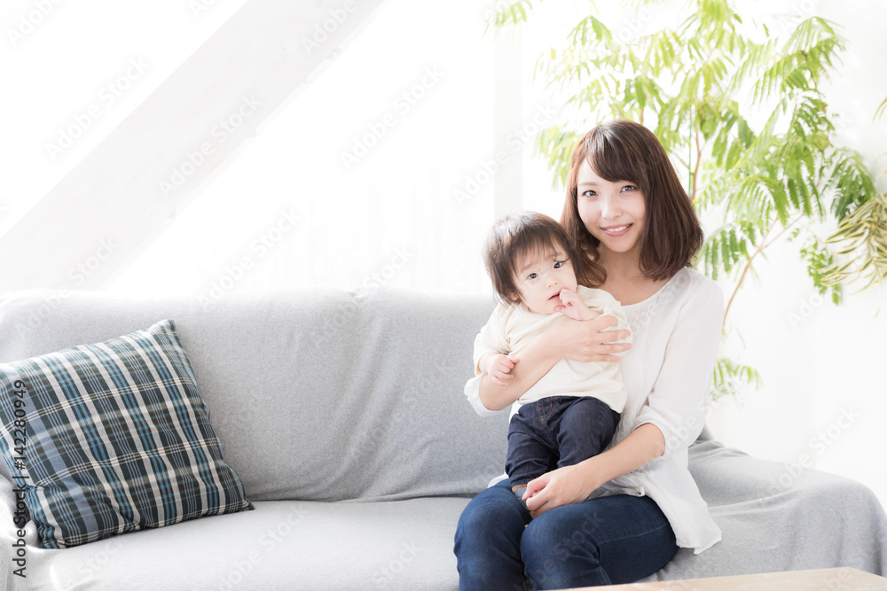 young asian family in living room