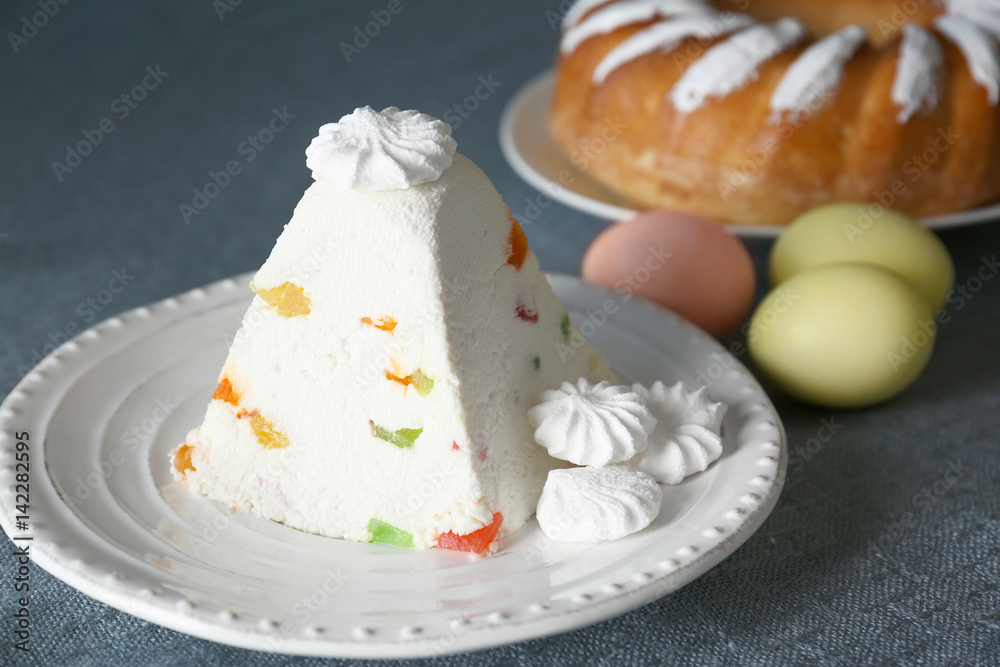 Traditional curd Easter cake with candied fruits on table