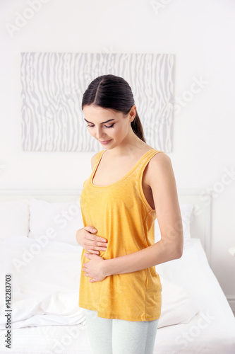 Beautiful young pregnant wo...