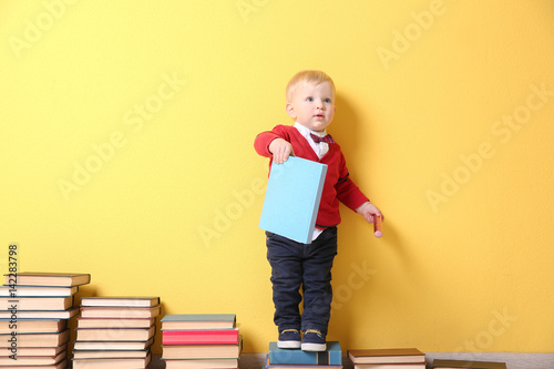 Cute little boy with plenty...