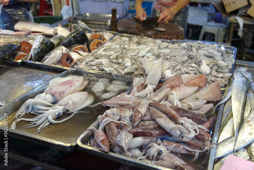 fresh fish and squid at wet market