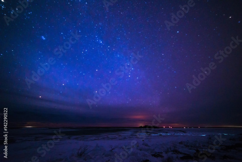 Milky way over Lake Huron in Winter on the Bruce Peninsula © claire