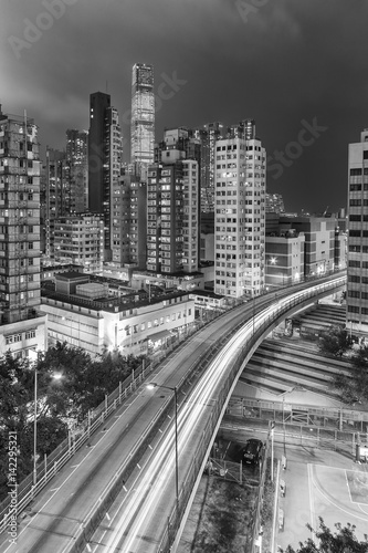 Busy traffic in Hong Kong city at night © leeyiutung