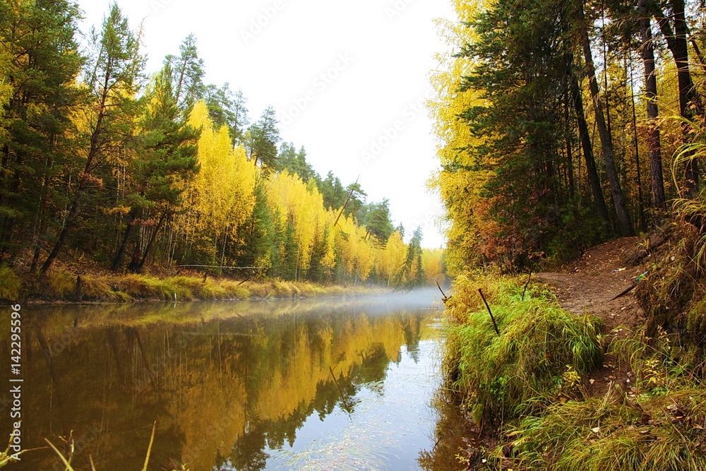River in Siberia in the beginning of autumn. River in Siberia in the beginning of autumn.