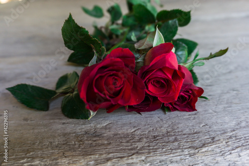 Red roses on wood floor  Valentine s day.