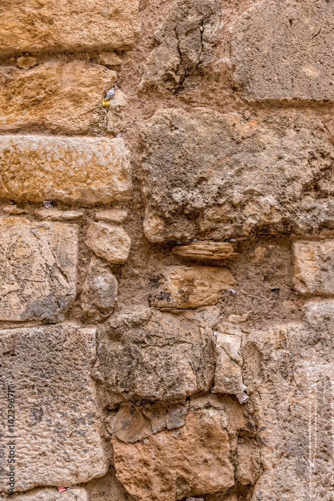 Little Western Wall, In East Jerusalem with paper notes embedded in the crevices between the stones Little Western Wall, In East Jerusalem with paper notes embedded in the crevices between the stones