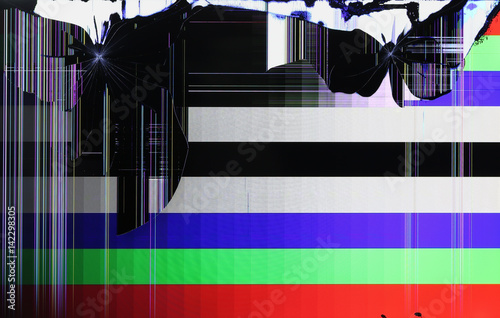 The LCD screen of the tv setis broken by shots from the traumatic gun. photo