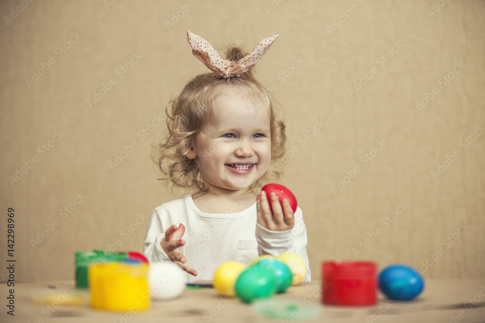 Small cute baby color Easter eggs on the table in colours, happy Easter! Small cute baby color Easter eggs on the table in colours, happy Easter!