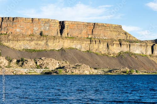 Banks lake and the walls of Grand Coulee in Steamboat Rock state park in Eastern Washington state, USA