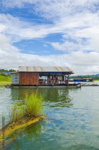 Houseboat on river in Sangk...